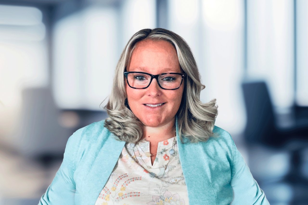 Portrait of Brytani Griner in work environment.