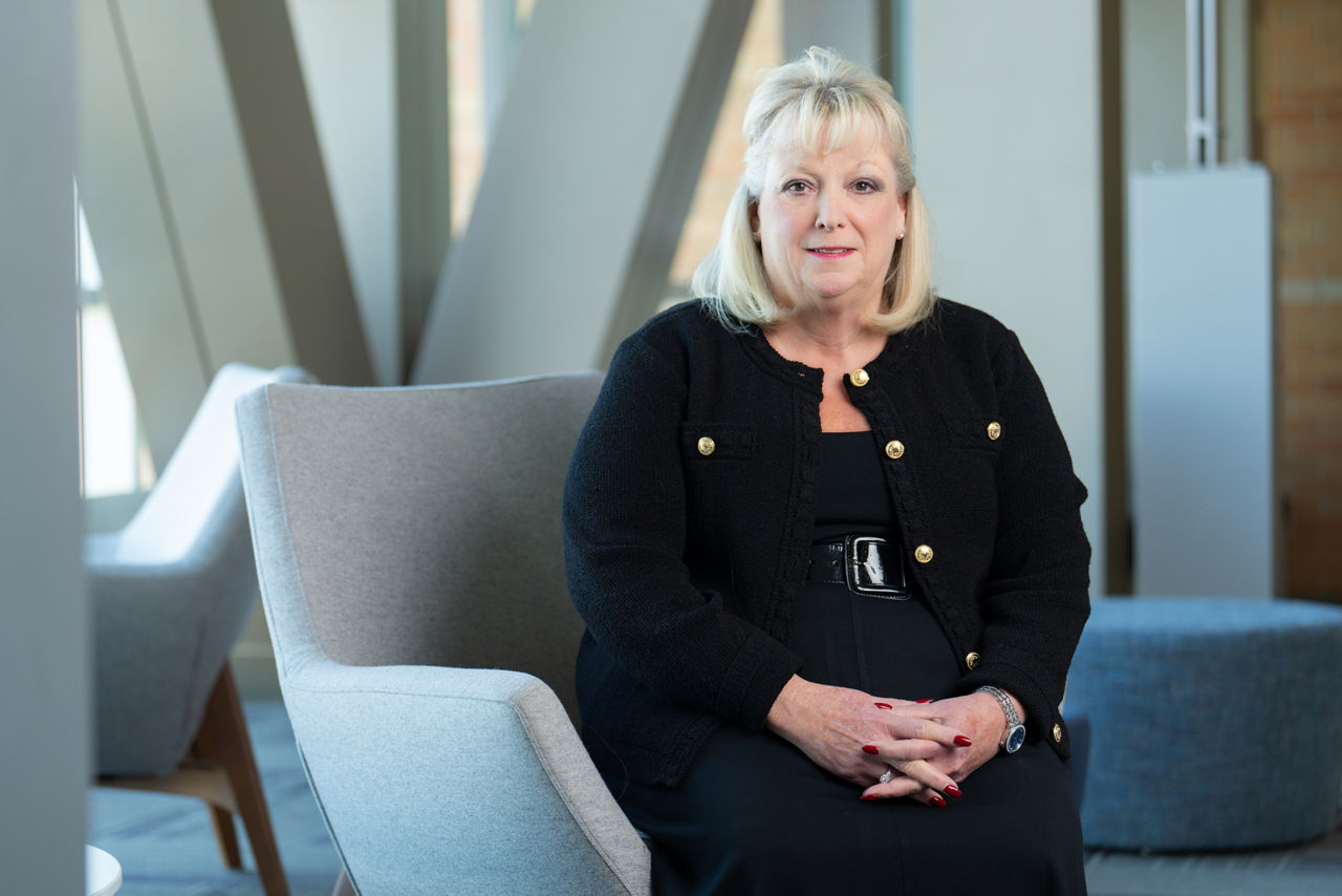 Executive portrait of Solventum's health information system business group president.