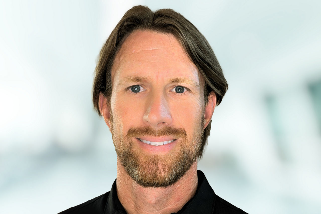 Headshot of Brinton Frisby.