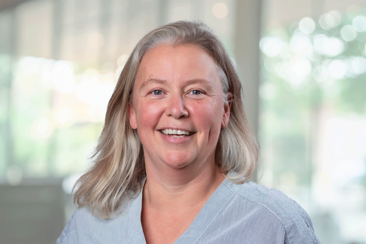 Portrait of Karen Pien in work environment.