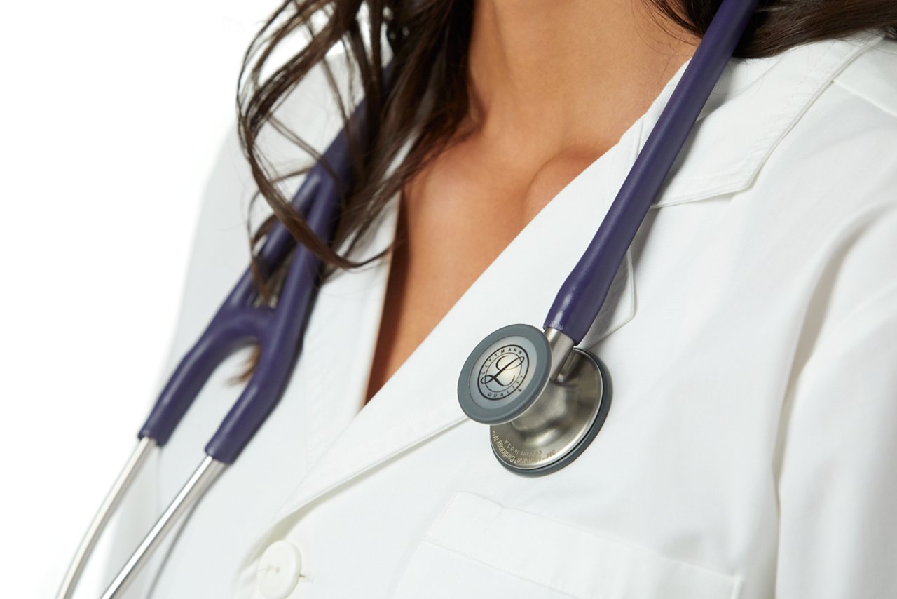 Model wearing white coat with Midnight Blue Satin Finish stethoscope extra close up