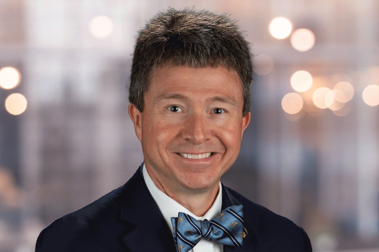 A smiling man with a bowtie.